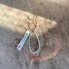 Modedesigners nyckelringar pärla pärlor conch nyckelring kvinnor tillbehör väska dekorera ornament nyckelhållare