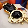 Diamond Keychain Luxury Designer Sunflower Doll Key Chains Women Bags Pendant Carabiner Keychains Lov louisely Purse vuttonly lvlies viutonly vittonly BMSS