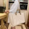 Sconto del 70% sulle borse Borse di lusso alla moda in tela Borsa da spiaggia con perle Zaino da donna grande di tendenza classica portatile Vlm5