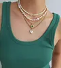 Collane con ciondolo Collana con medaglione di perle di conchiglia naturale Catena Figaro in acciaio inossidabile con bordo bianco Gioielli a forma di cuore con zirconi a forma di buco della serratura ERLI