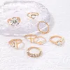 Neues geometrisches Liebesblumen-Diamant-Ring-Set mit acht Teilen, Legierung, frittierter Teig, Twist-gerader Linie-Ring-Set