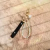 Designers de moda Keychains Pearl Beading Conch Keyrings Acess￳rios Mulheres Bolsa Decoram ornamentos Titular
