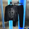 Survêtements pour hommes Sweat-shirt et pantalons de survêtement Ensemble 2 pièces / Design d'hiver Survêtement pour homme Artisanat Drill Skull Sweat à capuche surdimensionné brillant