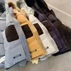 العلامة التجارية رجال Topstoney Parkas 21FW Metal Nylon أسفل القطن سترة دافئة معطف الكفة المطرز