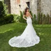 Stropplös sjöjungfru bröllopsklänning 2022 Sommarapplikationer Deep V Neck Backless Tiered Design Robe de Mariee Bridal Gown