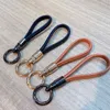 Wholesale quality Creative Leather Key Chain Package Pendant Car Keys Chain Ornaments Small Gifts Lanyard Fitting