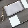 디자이너 키 케이스 Pochette Luxury Keychain 지갑 패션 패션 남성 키 홀더 미니 코인 지갑 갈색 가죽 가방 선임 캐리 편리