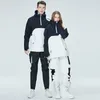 Costumes de ski Couple d'hiver hommes Veste de travail de travail et pantalon imperméable du manteau de snowboard imperméable pantalon 221020