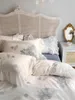 Set biancheria da letto stile antico sfondo bianco con stampa blu ricamo cotone set quattro pezzi pizzo coreano cavo