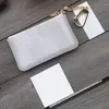 Designers key case lady pochette de luxe porte-clés portefeuille mode homme porte-clés mini porte-monnaie sac en cuir marron senior transporter pratique