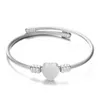 Top avec bracelet en acier inoxydable fil tressé coeur bracelets câble fil titane aciers coeur ornements