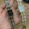 Mode des montres à quartz de la famille C pour femmes, double cuir, double maillon de chaîne, A11258g