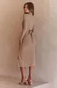 カジュアルドレス女性用ボタンスリット長袖リブ付きファッションドレススリムフィットと気質バッグヒップミディスカート