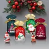 Confezione regalo 50 pezzi Sacchetti di caramelle di buon Natale Sacchetto di plastica di Babbo Natale Decorazione di scatole regalo per biscotti di Natale