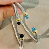 Bangle Cable Classic Collection Bracelet With Blue Topaz And Black Onyx 18K Yellow Gold265C