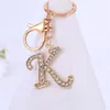 Chaveiros requintados A-Z 26 Letter Rhinestone liga-ligas Charms de ouro iniciais de ouro Key Ring Women Women Holder Bag Ornaments Accessoreis