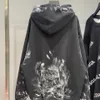 2022 Tasarımcı Moda Markaları Hoody Hoodie El boyaması Graffiti Benekler Erkekler ve Kadınlar İçin Baskılı Peluş Peluş Gevşek Kazak