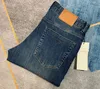 Modne dżinsy dla męskich projektantów spodni alfabetyczny Mężczyźni proste, swobodne szczupłe spodnie dżinsowe nogi