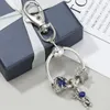 Keychains Silver Color Moon Star Astronaut Pendant Charm Keychain For Women Men Car Bag Keyring Accessions Wedding Party Gift