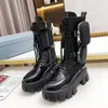 Leder-Nylonbeutel-Knöchel-Kampfstiefel mit Plateau, Keilabsatz, Schnürung, runder Zehenbereich, Blockabsatz, flache Stiefeletten, klobiger Luxusdesigner für Damenfabrik