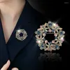 Broches luxe vrouwen meisjes draai prachtige temperament krans glanzende strass broche pinnen elegante ingelegde zirkoonaccessoires