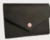 Womens Designer Emilie Wallet Classic Button Short Wallets Fashion Märke visar Exotic Leather Pouch Round Coin Purse Card Holder 41938