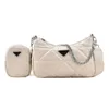 Designer Handbag Store 70% de réduction sur la version de sac à main couleur unie triangle couture tendance enfant mère simple chaîne de messager unique femmes ventes a4yq