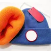 Créateur de mode Chapeaux Tricotés Bonnets D'hiver Unisexe Broderie Crâne Caps Bonnet Hommes Femmes Solide Couleur Crochet Chapeau À Tricoter Bonnet Sport Chaud Oreille Muff Classique