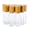Bouteilles à rouleaux en verre transparent de 10 ml avec couvercles en bois de bambou naturel Rouleau d'huile essentielle cosmétique sur emballage de tubes