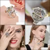 Anneaux de mariage Anneaux de mariage Blucome Carrousel de luxe en acier inoxydable Bague en zircon incrusté à la main Mignon Romantique Femmes Fille Fête Vacances Ac Dhbht