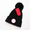 Mode brief gebreide hoeden winter pompon beanies mannen vrouwen pom poms schedel petten motorkap trendy ontwerper haak hoed hoed breanie bonene out ear muff cadeaus elastisch