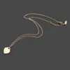 Classique T-Lettre Coeur Pendentif Collier Tout Nouveau Créateur De Mode Collier pour Hommes et Femmes couple bijoux en acier inoxydable neckl296A