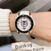 Pareja clásica Reloj de cuarzo con bisel de cerámica negro Patrón de buceo geométrico Reloj de pulsera CAT Relojes con dijes de estrellas geométricas Mujeres Hombres Wh295Q