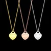 Klassisk T-Letter Heart Pendant Necklace helt ny modedesigner halsband för män och kvinnor par rostfritt stål smycken halsg224x