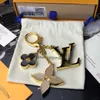 Fleur de Monogram sleutelhanger tas Hanger m67119 Gouden ketting