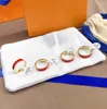 Дизайнеры высококачественные буквы кольца мужская мода женская роскошная классическая ювелирная пара пара кольцо кольцо изыскание ювелирные ювелирные украшения подарки