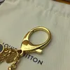 Porte-clés de sac Fleur de Monogram Pendentif m67119 Chaîne dorée2702