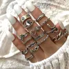 Großhandel Klatsch Schlange Blatt Ring Blume Liebe Schmetterling Schädel Kette Knuckle Ring Anzug europäisch und amerikanisch