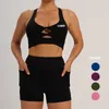 Aktiva uppsättningar anlända kvinnor sportkläder tätt persika skinkor som kör elastisk träning Aktivkläder Gym Fitness Yoga Wear Set Bra Shorts