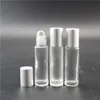 100 pezzi/lotto da 10 ml di vetro spesso limpido su bottiglie di profumo di oli essenziali con sfera a rulli in acciaio inossidabile Lin2896