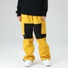 Skiing broek 22 producten oversized losse gereedschap kleur matching ski dames winddichte en waterdichte herenpakken