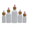 Portable Vide Verre Blanc Bouteille Cosmétique En Bois Collier Rose Blanc Haut En Caoutchouc Pipette Flacons Rechargeable Emballage Conteneur 10 ml 15 ml 20 ml 30 ml 50 ml 100 ml