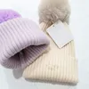 Bambini Pompon Cappelli lavorati a maglia Lettera di moda Berretti Ragazzi Ragazze Pom Poms Berretti a maglia Cappellino per bambini Berretto invernale M Designer Paraorecchie 2023