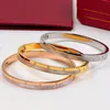 Designer Bulbões de jóias de luxo Bulbagelas femininas Bracelete de ouro rosa Platina Pulseiras de aço inoxidável para mulheres Acessórias por atacado