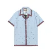 uxury designer skjortor mens geometriska tryck bowling skjorta hawaii blommor casual skjortor män kort ärm camicie hawaiane kemis
