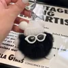 Peluş kömür topu anahtar zincirleri kolye çanta karikatür peluş bebek kolye serin araba anahtarlık