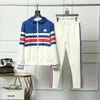Designer Tracksuits Män och kvinnliga byxor passar Outdoor Zipper Stripe Top Högkvalitativ sportkläder Mensbyxor GU