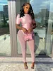 Femmes deux pièces pantalons ensembles femmes 2022 été Club Sexy pantalon à manches courtes haut court maille transparent voir à travers pantalon Fitness 2 pièces