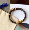 Braccialetti con ciondoli Bracciale con lettera di design Braccialetti in oro Donna Uomo Doppio ponte in pelle Marchio di moda di alta qualità Pendenti con serratura Regalo di anniversario