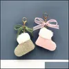 Nyckelringar Lanyards julstövlar Keychain Faux Fur Keychains Cute Bow Bag Pendant Key Holder Cartoon Plush Car Keyring Women Gif Dhygd